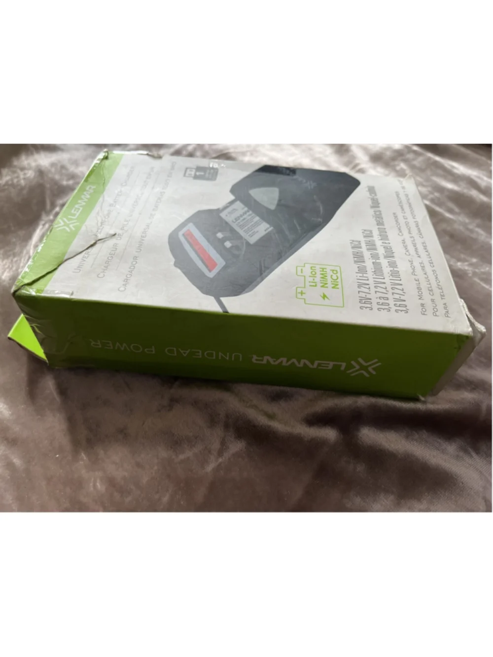 RARE FINE All-in-one battery charger for Mobile Phones, Cameras, and Camcorders